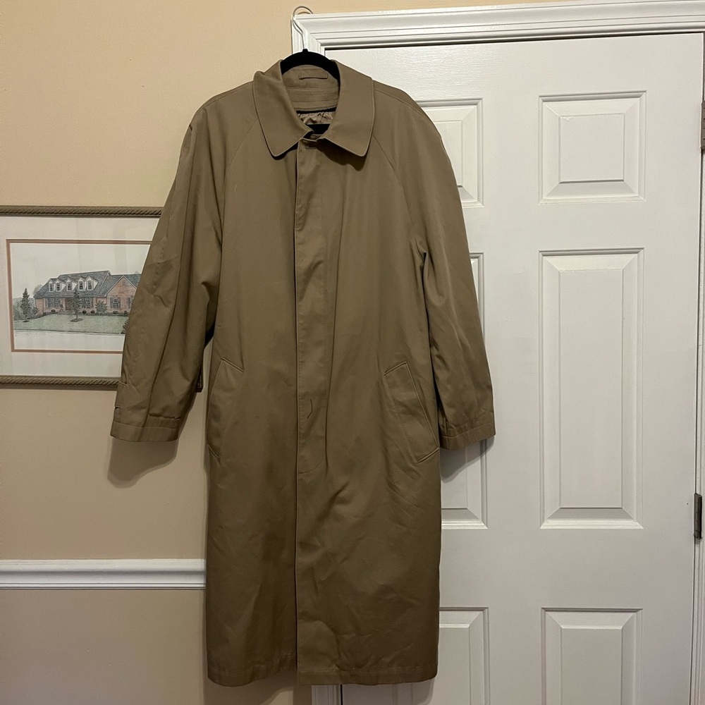 Selling a tan London Fog trench coat. Removable inner lining.  Size- 44 regular